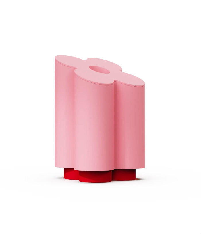 A pink sculptural candle from the In Bloom collection